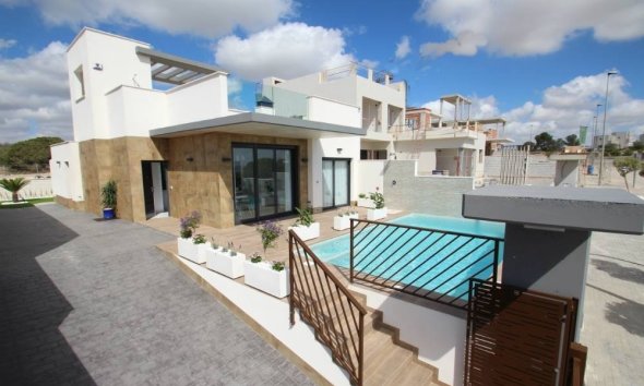 Obra nueva - Villa -
Orihuela Costa - Campoamor